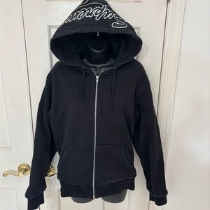 Supreme Black Zip Up Hoodie with Red Script Tag